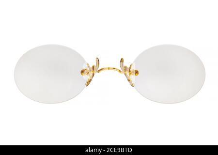 Vintage frameless circular eyeglasses isolated on a white background Stock Photo