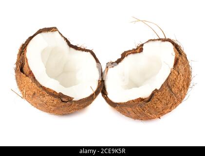 Two halves of coconut on white background Stock Photo