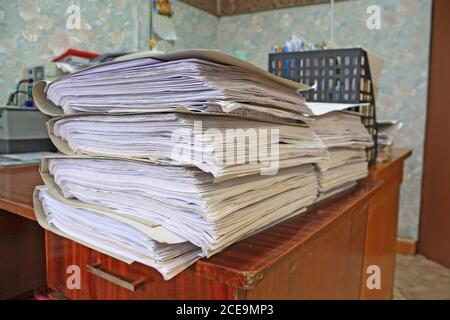heap of the papers on table in office Stock Photo
