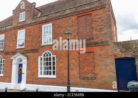Bricked up windows (to avoid Window Taxes), Old Rectory house, Cathedral & Abbey Church of Saint Alban, St Albans, Hertfordshire, UK. Stock Photo