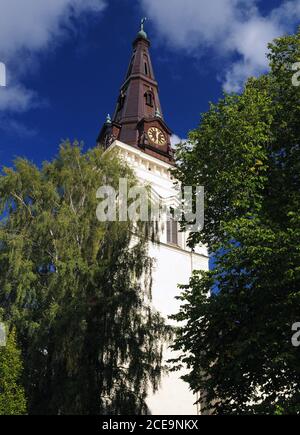 Clock Tower Of Domkyrka Cathedral In Karlstad On A Sunny Summer Day With A Clear Blue Sky Stock Photo