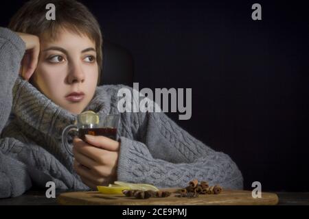 Young woman with hot drink Stock Photo