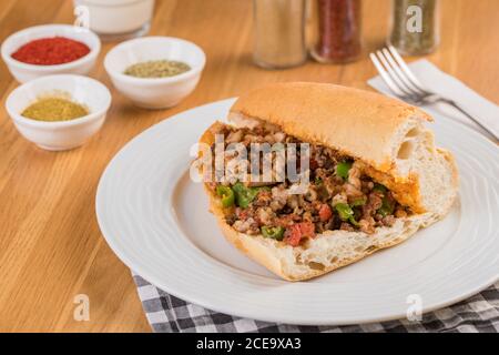 Traditional Turkish Food Kokorec on wooden table. Stock Photo