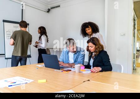 man giving presentation in office Stock Photo