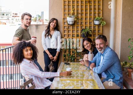 Colleagues chatting and laughing Stock Photo