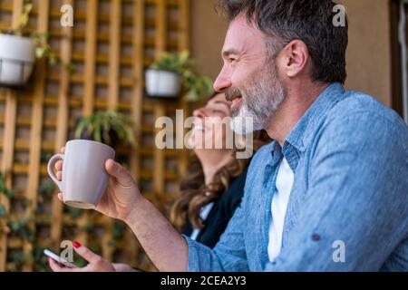 Colleagues chatting and laughing Stock Photo