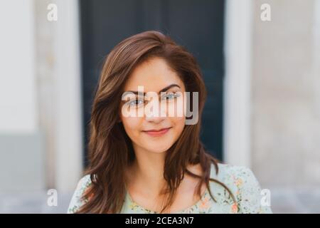 Pretty young Woman looking at camera Stock Photo