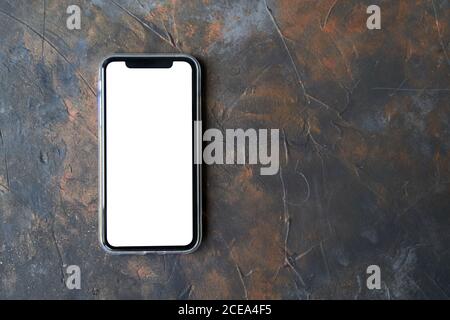 Kaliningrad, Russia - 08.08.2020: A black smartphone on a dark background. Stock Photo
