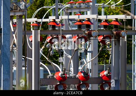 Image of a voltage transformer substation, the facility where  high voltage electric current carried through heavy duty power lines ends up for voltag Stock Photo