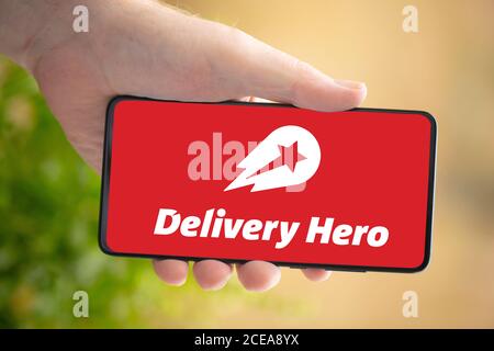 WETZLAR, GERMANY 2020-08-26 In this photo illustration an DELIVERY HERO Logo seen displayed on a smartphone. Stock Photo