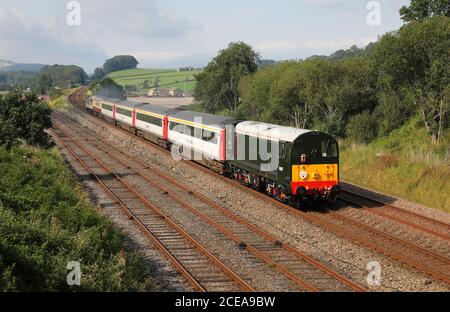 D8107/20107 passes Settle Jc with a Rail Charter services train.t Stock Photo