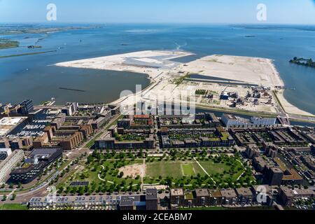 The development near the IJ in Amsterdam the Netherlands from the air. Stock Photo