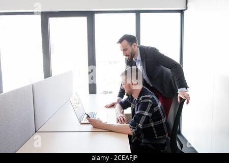 Group of colleagues working in contemporary office Stock Photo