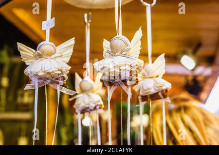 Traditional Hungarian toys angels for interior decoration in the Christmas market in Budapest, Hungary Stock Photo