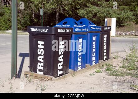 https://l450v.alamy.com/450v/2ceajdw/trash-bins-and-recycling-bins-at-entrance-to-neshotah-beach-park-two-rivers-wisconsin-2ceajdw.jpg