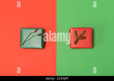 two box gifts for Christmas in green and red background Stock Photo