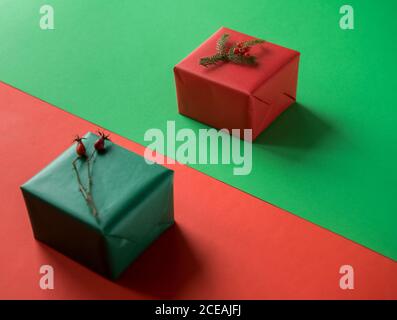 two box gifts for Christmas in green and red background Stock Photo