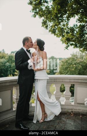 Married couple clinking glasses of champagne Stock Photo