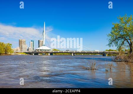 Provencher Bridge and skyline of downtown Winnipeg Manitoba Canada Stock Photo