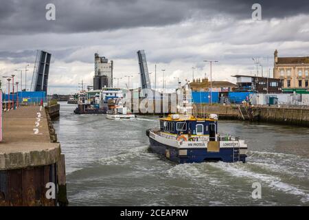 The Bascule Bridge at Lowestoft, Suffolk, UK, open to admit boats from The North Sea into Lowestoft Harbour and The River Waveney. Stock Photo