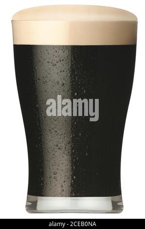 Closeup view of glass of black beer with froth on top isolated on white background Stock Photo