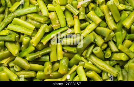 Green beans fried with onions close up texture. High quality photo Stock Photo
