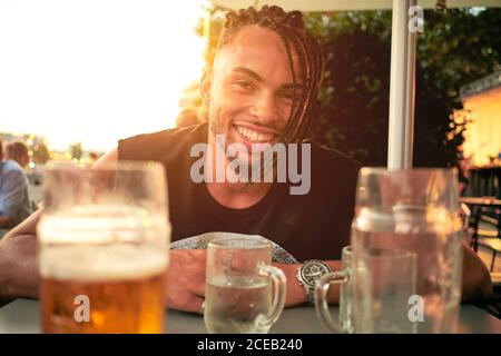 Young man sitting in bar Stock Photo