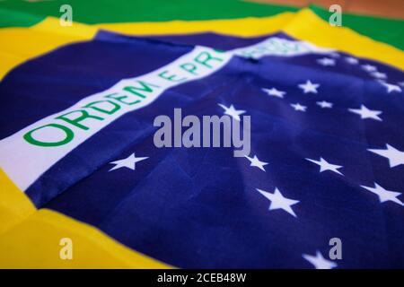 Brazilian flag kneaded - Dramatic concept image image. Stock Photo