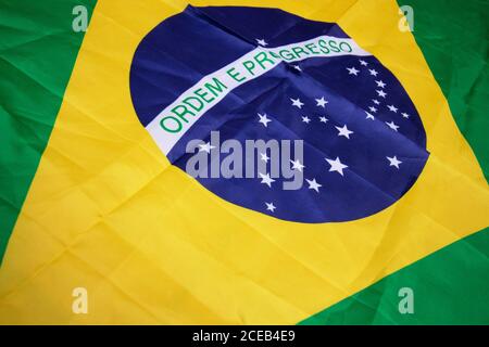 Brazilian flag kneaded - Dramatic concept image image. Stock Photo