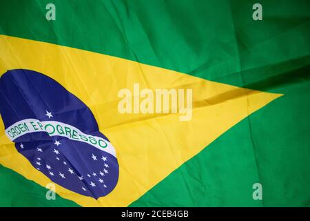Brazilian flag kneaded - Dramatic concept image image. Stock Photo