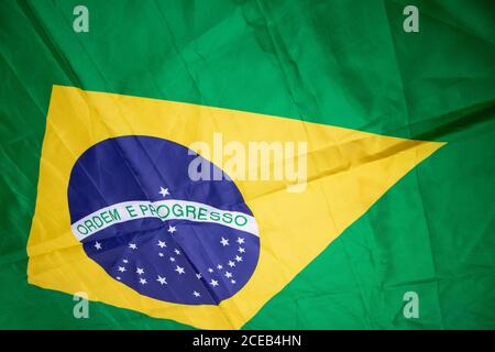 Brazilian flag kneaded - Dramatic concept image image. Stock Photo