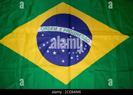 Brazilian flag kneaded - Dramatic concept image image. Stock Photo