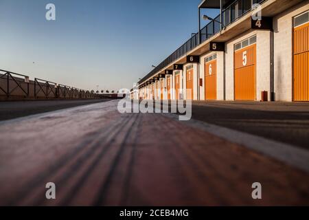 Road with colored entries on daylight with blue sky from bottom Stock Photo
