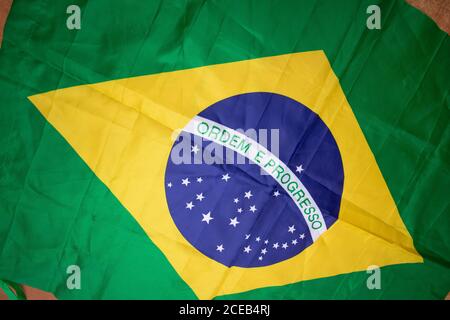 Brazilian flag kneaded - Dramatic concept image image. Stock Photo
