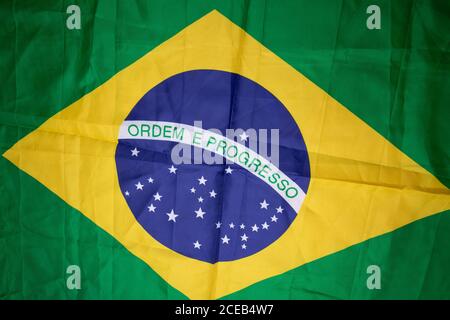 Brazilian flag kneaded - Dramatic concept image image. Stock Photo