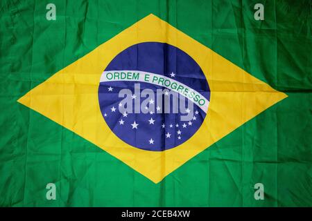 Brazilian flag kneaded - Dramatic concept image image. Stock Photo