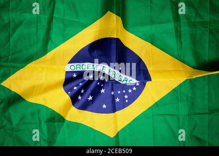Brazilian flag kneaded - Dramatic concept image image. Stock Photo