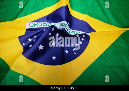 Brazilian flag kneaded - Dramatic concept image image. Stock Photo