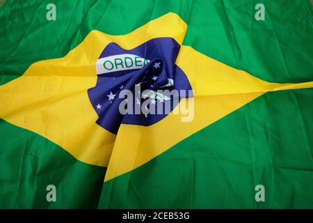 Brazilian flag kneaded - Dramatic concept image image. Stock Photo