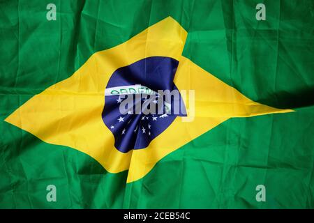 Brazilian flag kneaded - Dramatic concept image image. Stock Photo