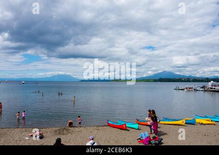 Puerto Varas, Chile. February 13, 2020. View of Llanquihue Lake beach and the volcanos Osorno and Calbuco Stock Photo
