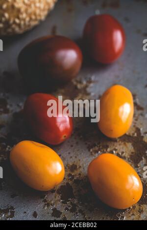 Tomatoes; fresh vegetables on black background Stock Photo