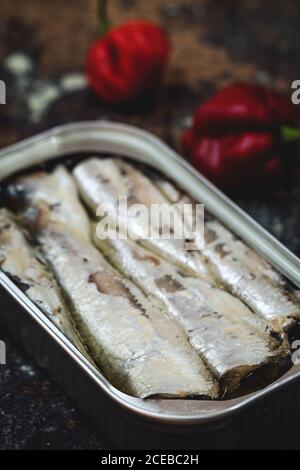Canned sardines on table Stock Photo
