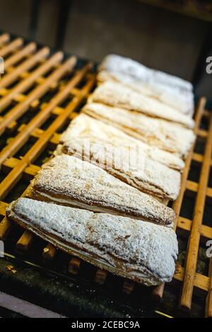 freshly baked buns with almonds.On marble table Stock Photo