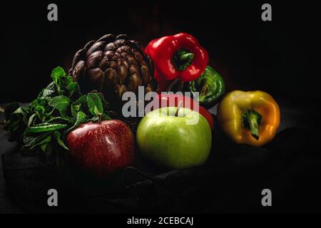 Mix of fresh vegetables on black background Stock Photo