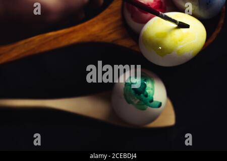 Crop hand painting Easter egg Stock Photo