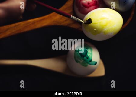 Crop hand painting Easter egg Stock Photo