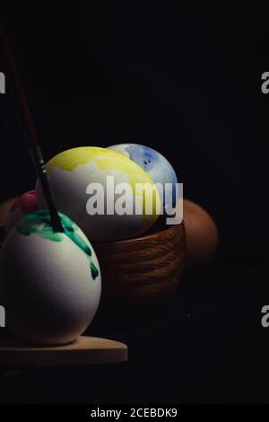 Crop hand painting Easter egg Stock Photo