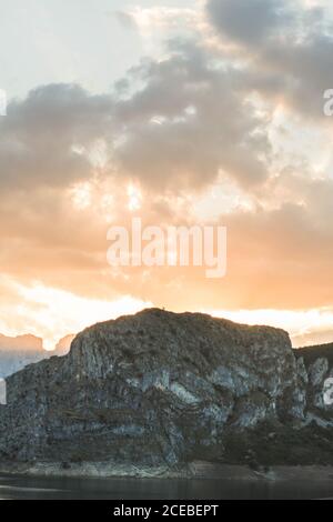 Calm sunset and clouds over lake Stock Photo - Alamy