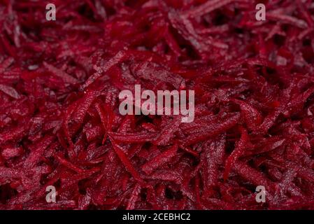 grated beet root closeup selective focus Stock Photo